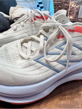 New Balance Light Cream Running Sneakers with Coral Accents